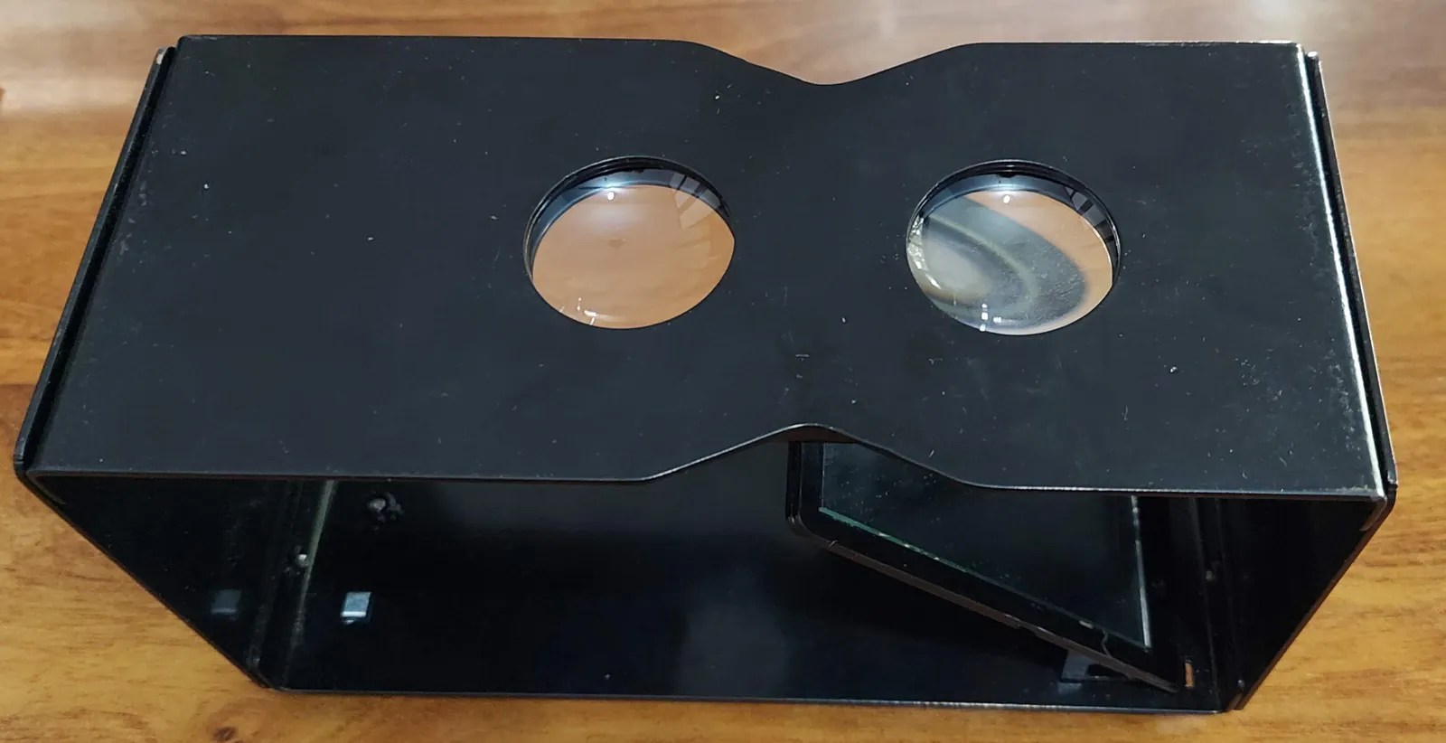 Top view of the Cheiroscope showing the twin eyepiece lenses and the mirror inside