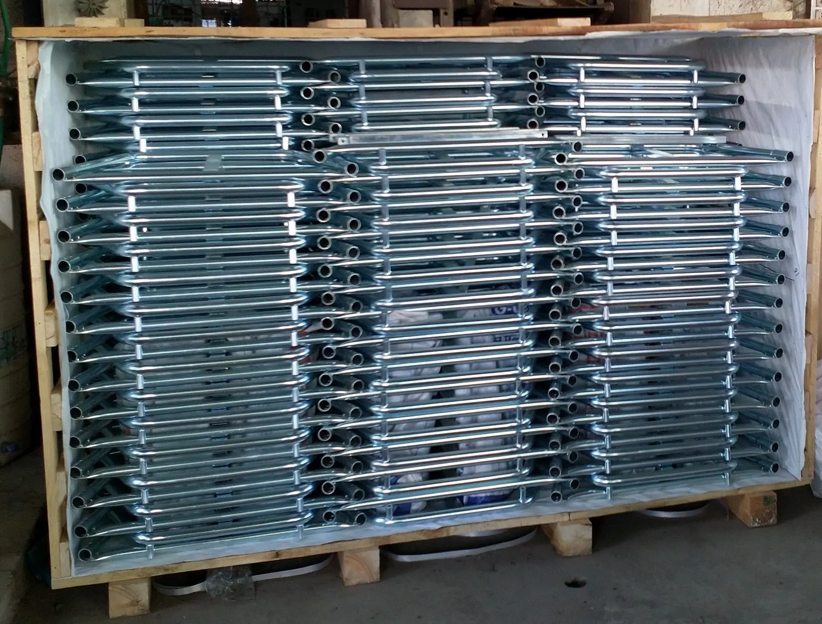 Zinc plated tube frames packed in an export crate