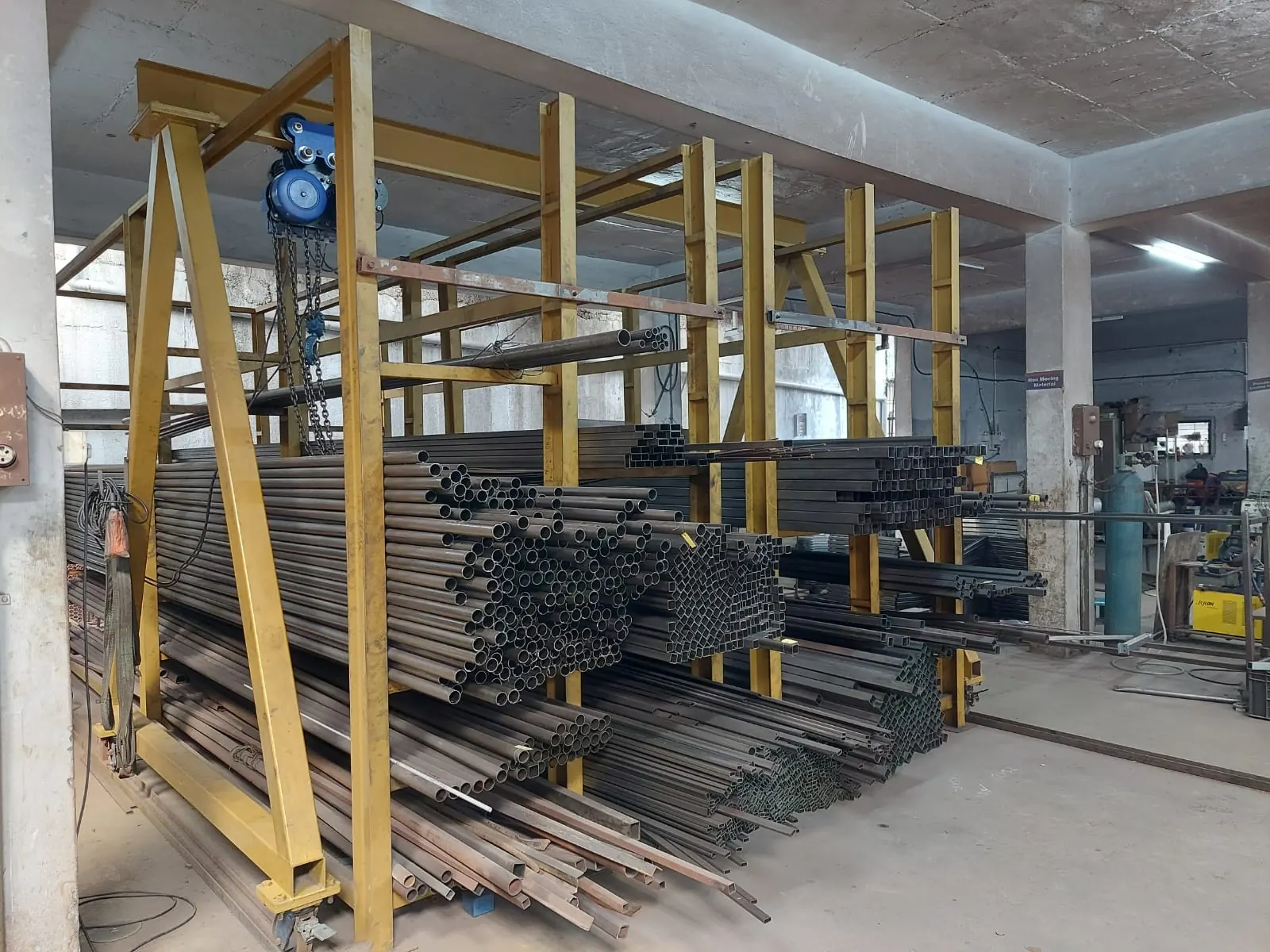 Tube stock rack with gantry hoist in the Spline Curves workshop